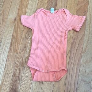 Kate Quinn Peach Ribbed Bodysuit